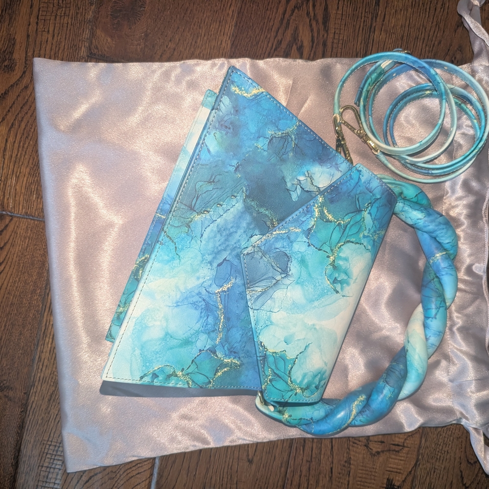 Anima Iris Blue and Gold Marble Clutch